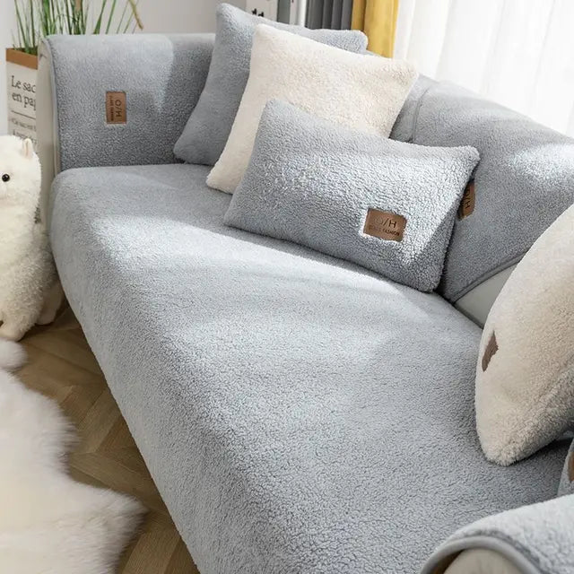 Sherpa fleece sofa cover with non-slip design, providing easy-clean, lint-resistant protection for couches in a cozy living room setting. 0